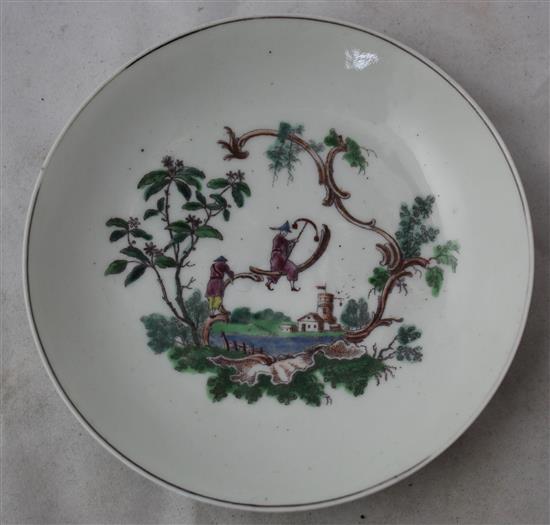 An early Worcester Les Garcon Chinois tea bowl and saucer, c.1760, saucer 11.9cm